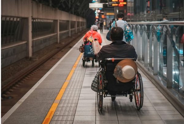 wheelchair users on train platform